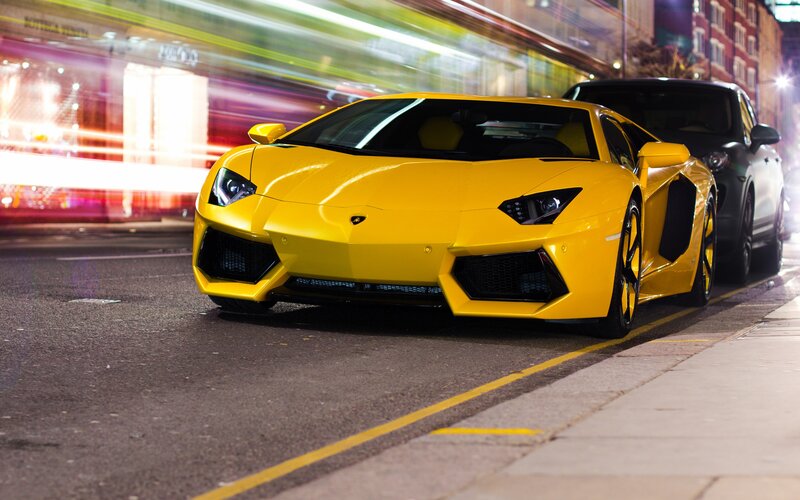 Yellow Lamborghini on city street