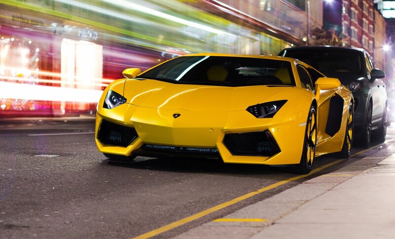 Yellow Lamborghini on city street