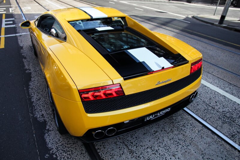Yellow Lamborghini on city street