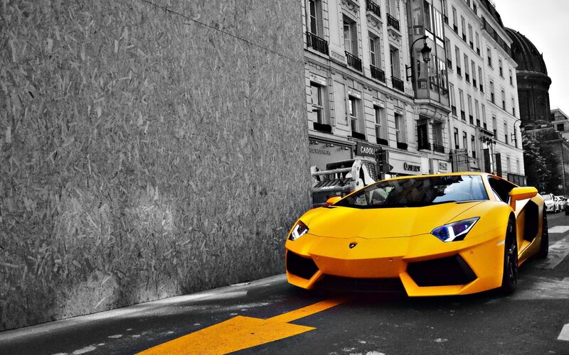 Yellow Lamborghini on city street
