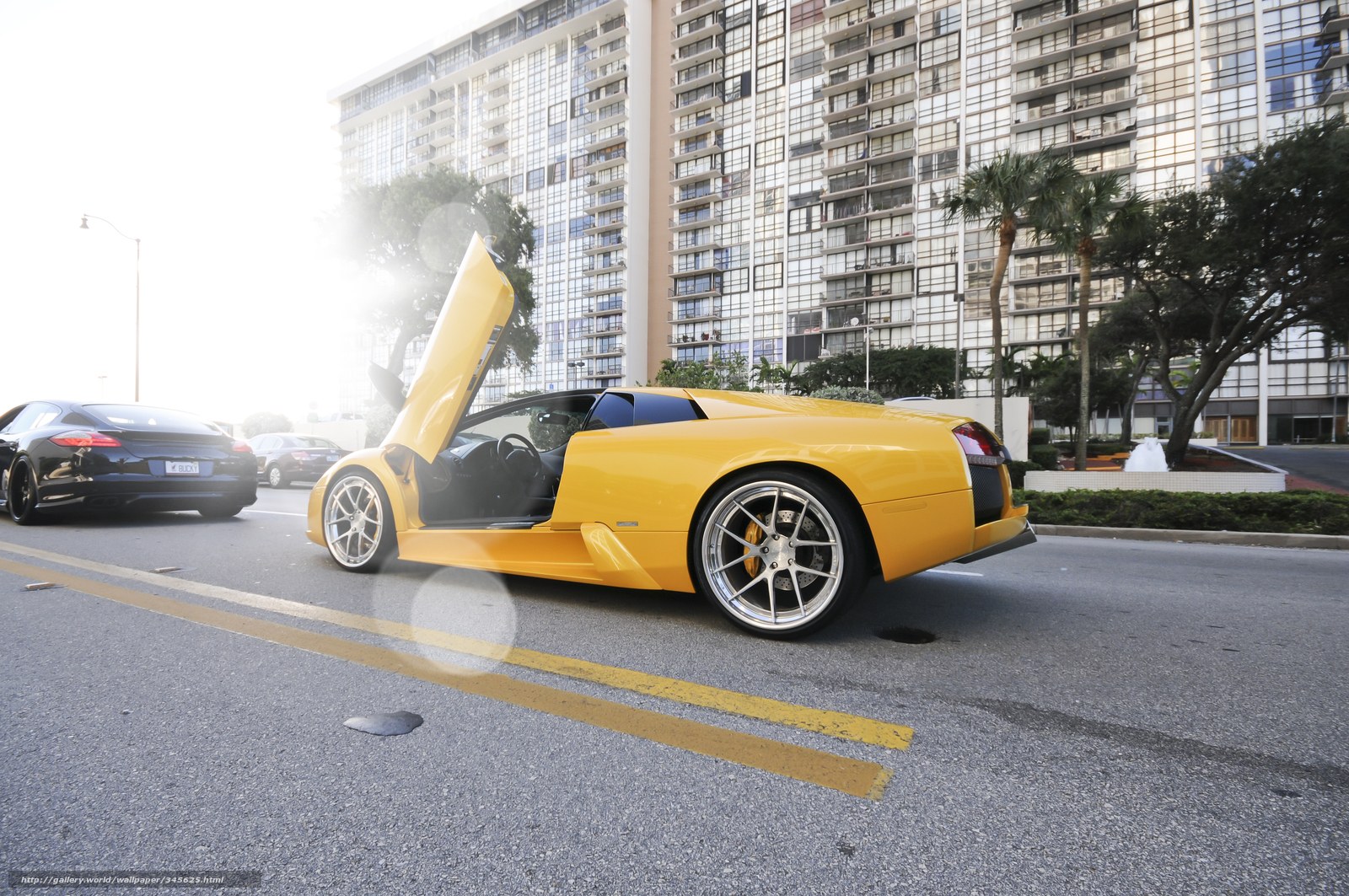 Yellow Lamborghini on city street
