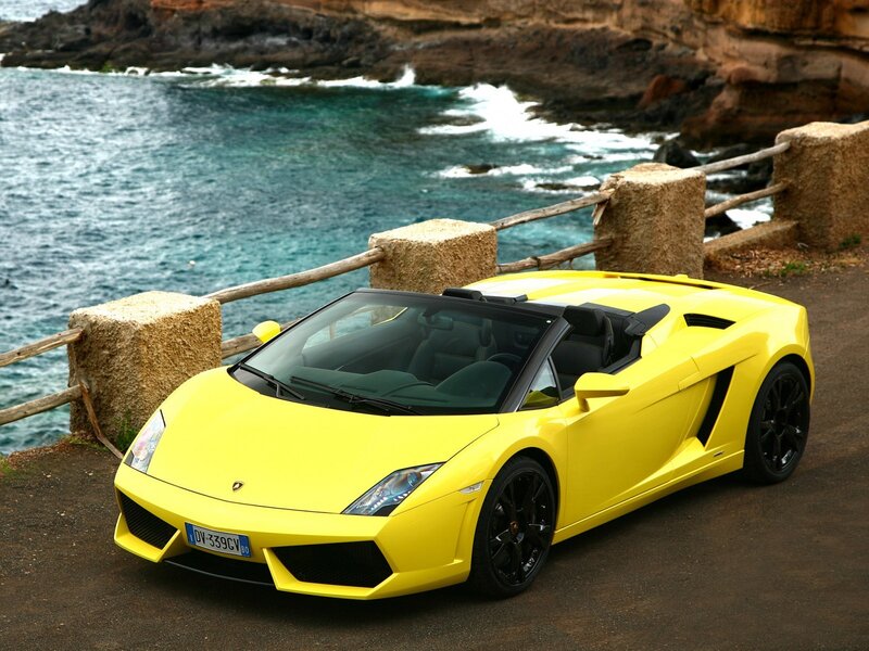 Yellow Lamborghini on coastal road