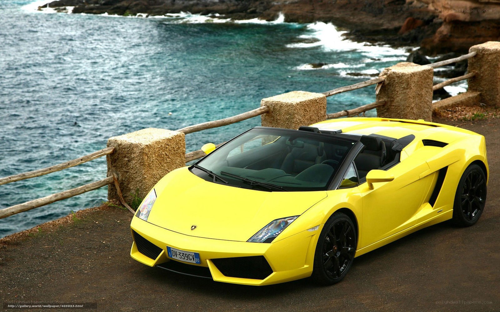 Yellow Lamborghini on coastal road