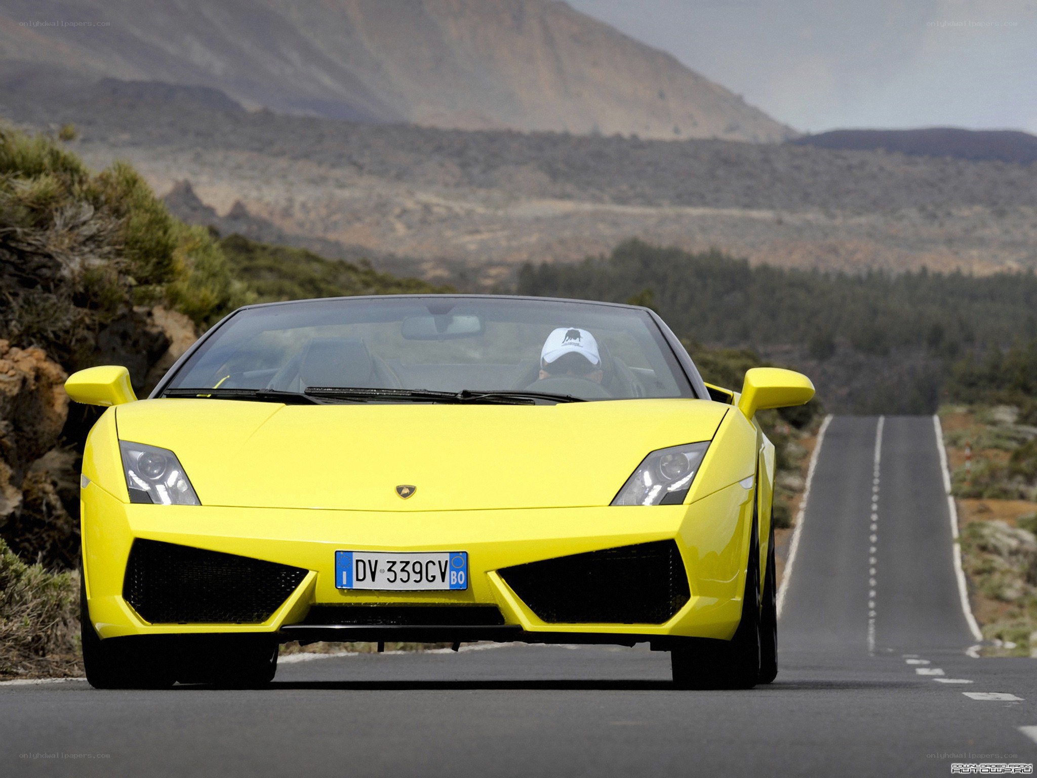 Yellow Lamborghini on mountain road