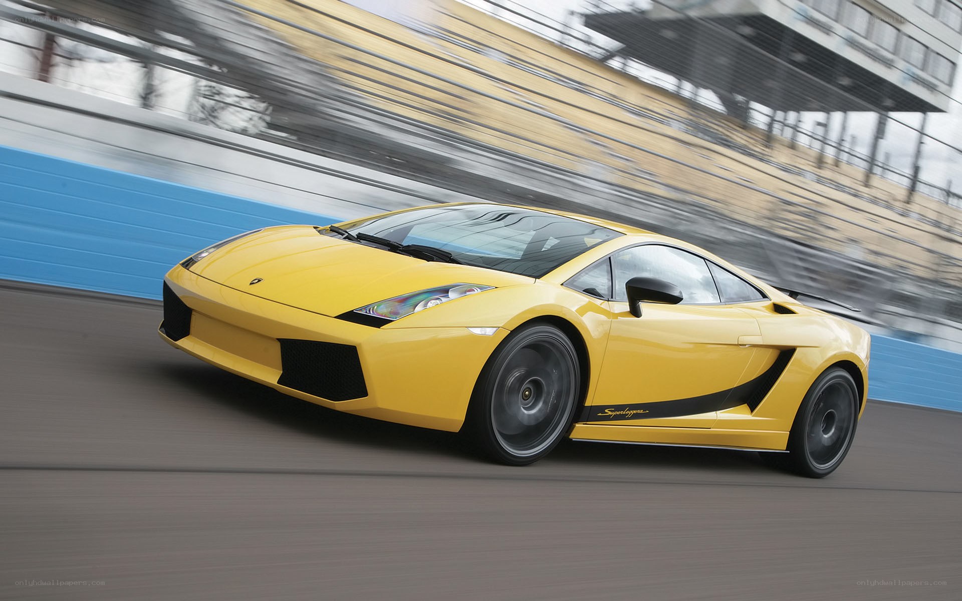 Yellow Lamborghini on racetrack