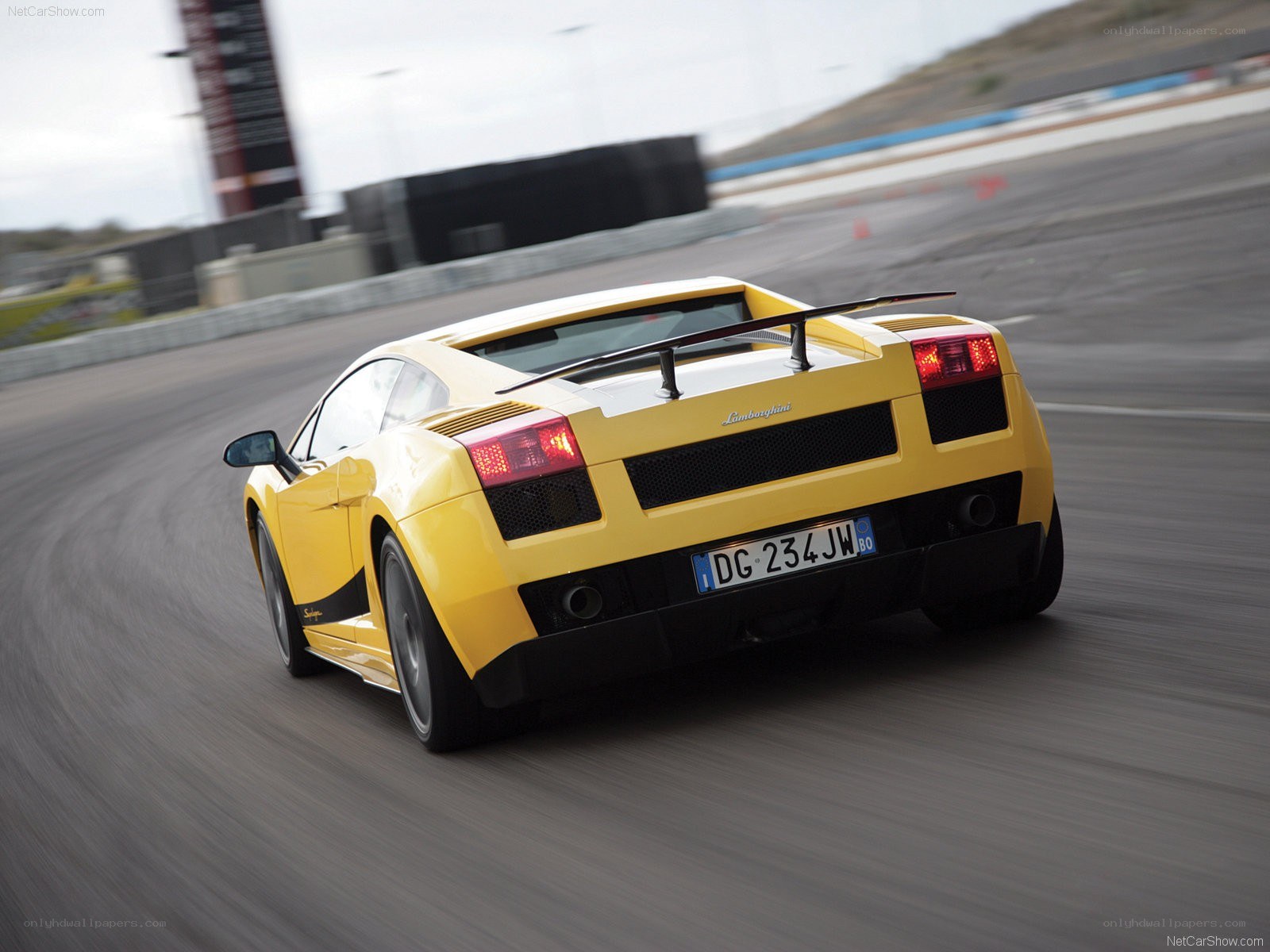 Yellow Lamborghini on racetrack