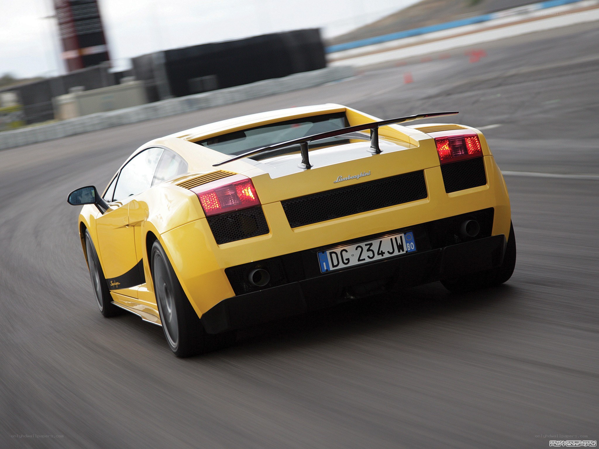 yellow Lamborghini on racetrack