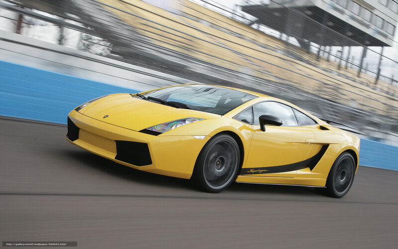 Yellow Lamborghini on racetrack