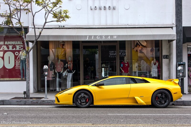 Yellow Lamborghini outside Jigsaw store