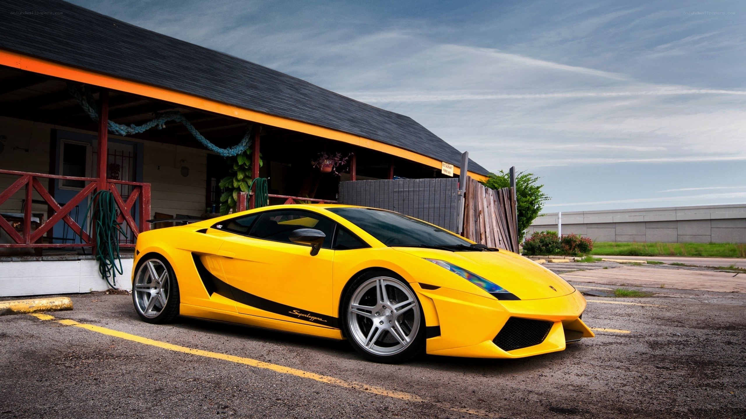 Yellow Lamborghini parked outside