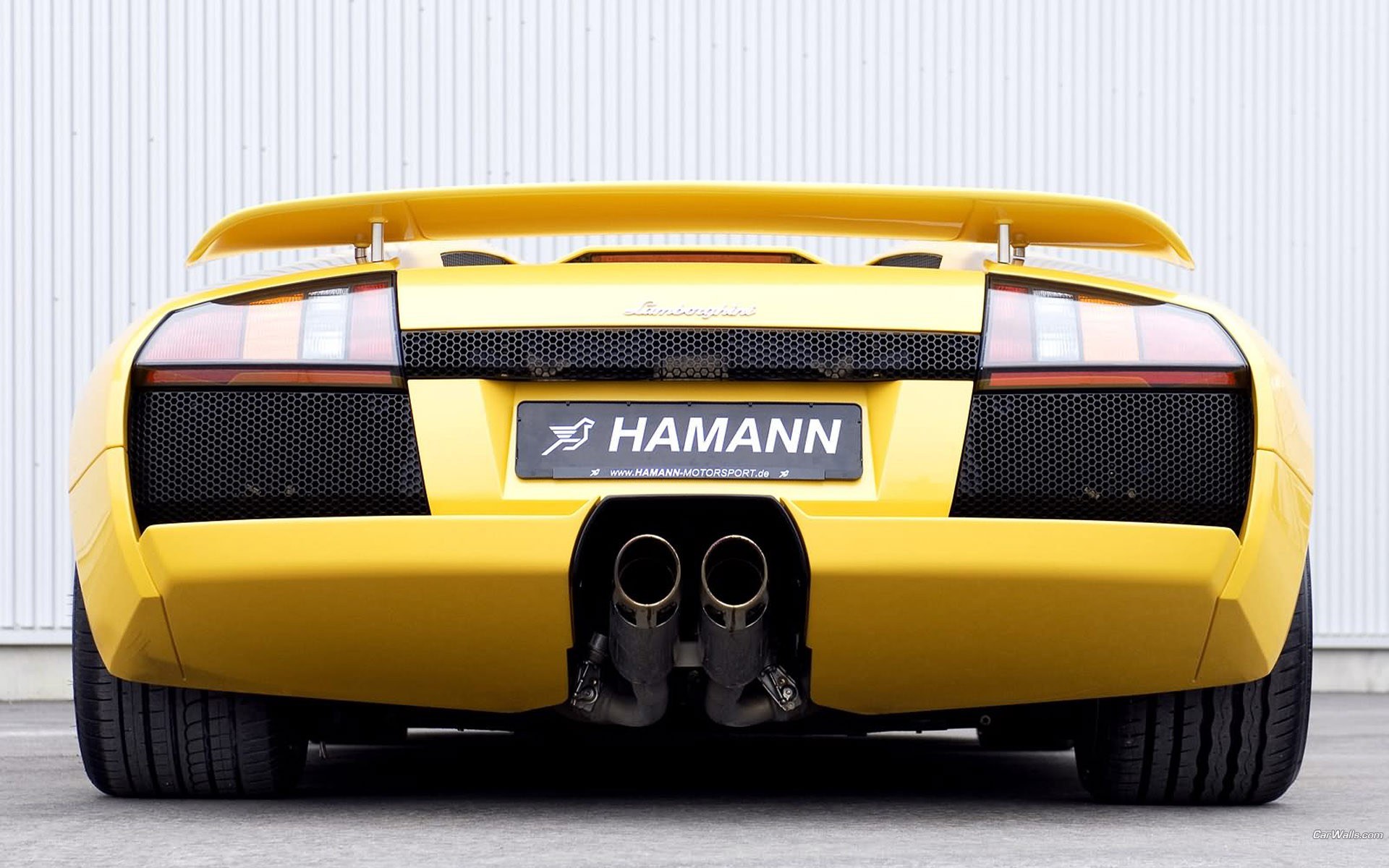 yellow lamborghini rear view