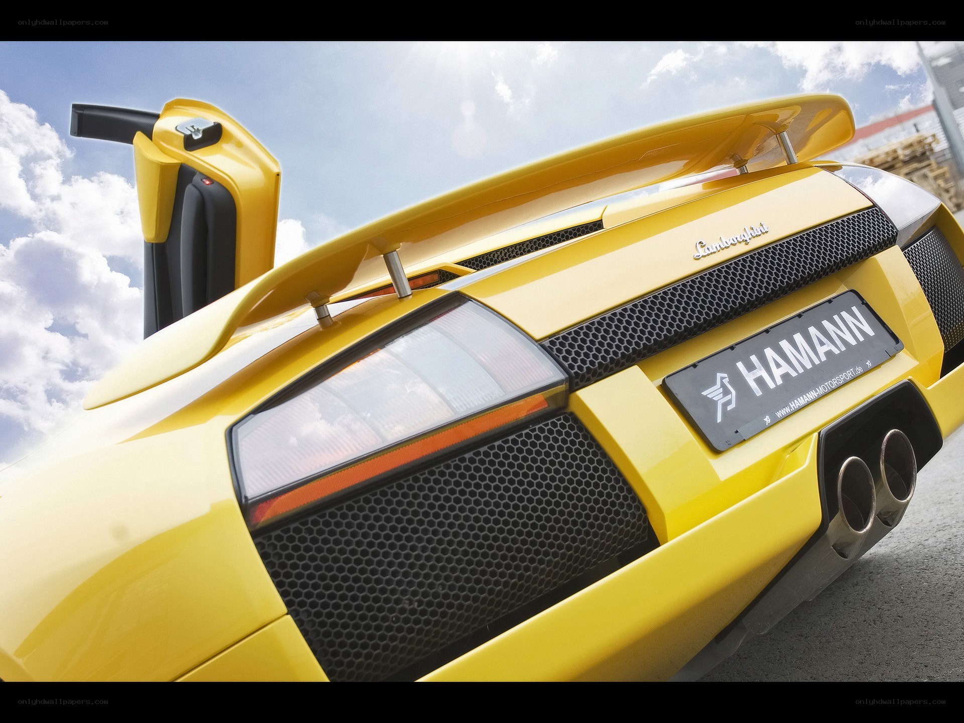 yellow lamborghini rear view