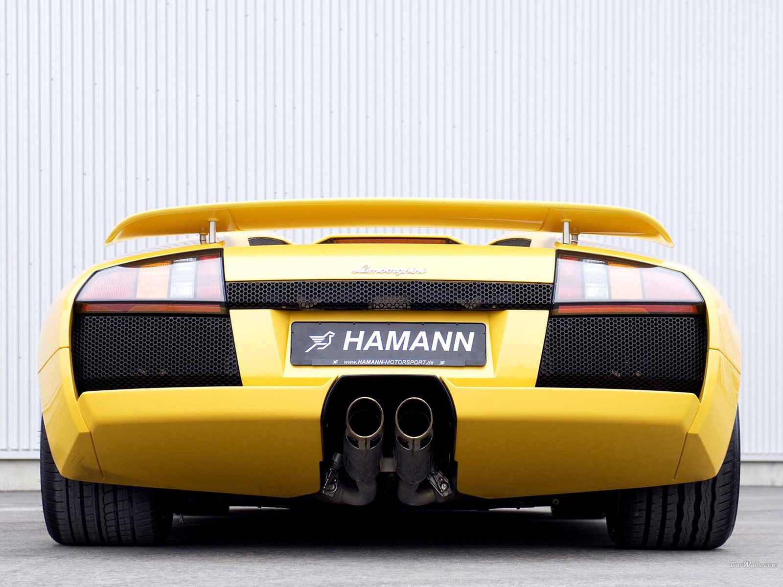 yellow lamborghini rear view