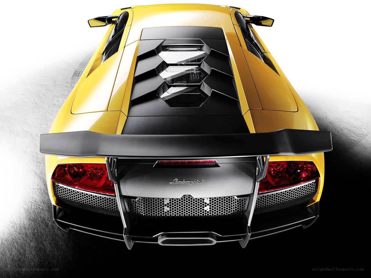 yellow lamborghini rear view