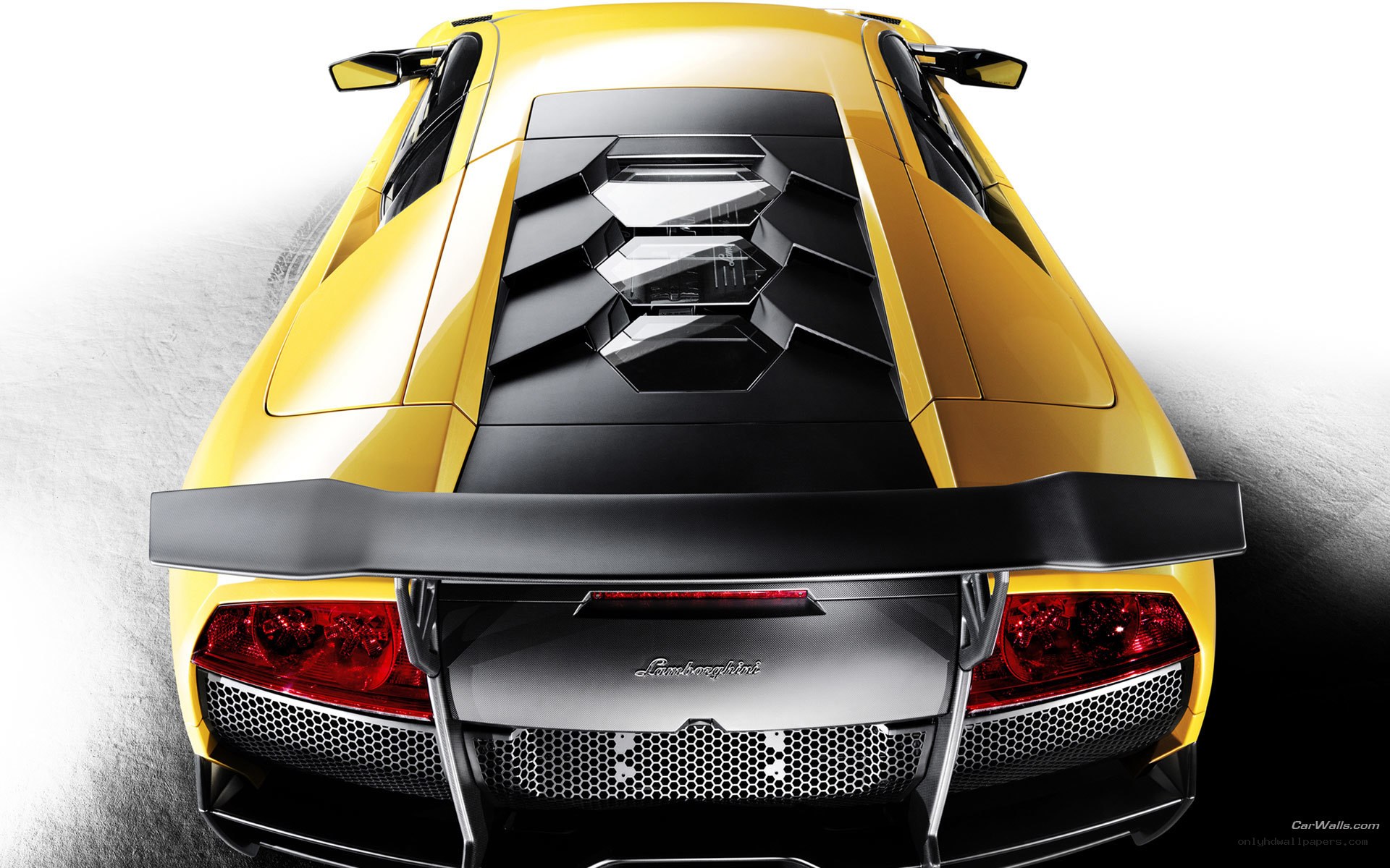 yellow lamborghini rear view