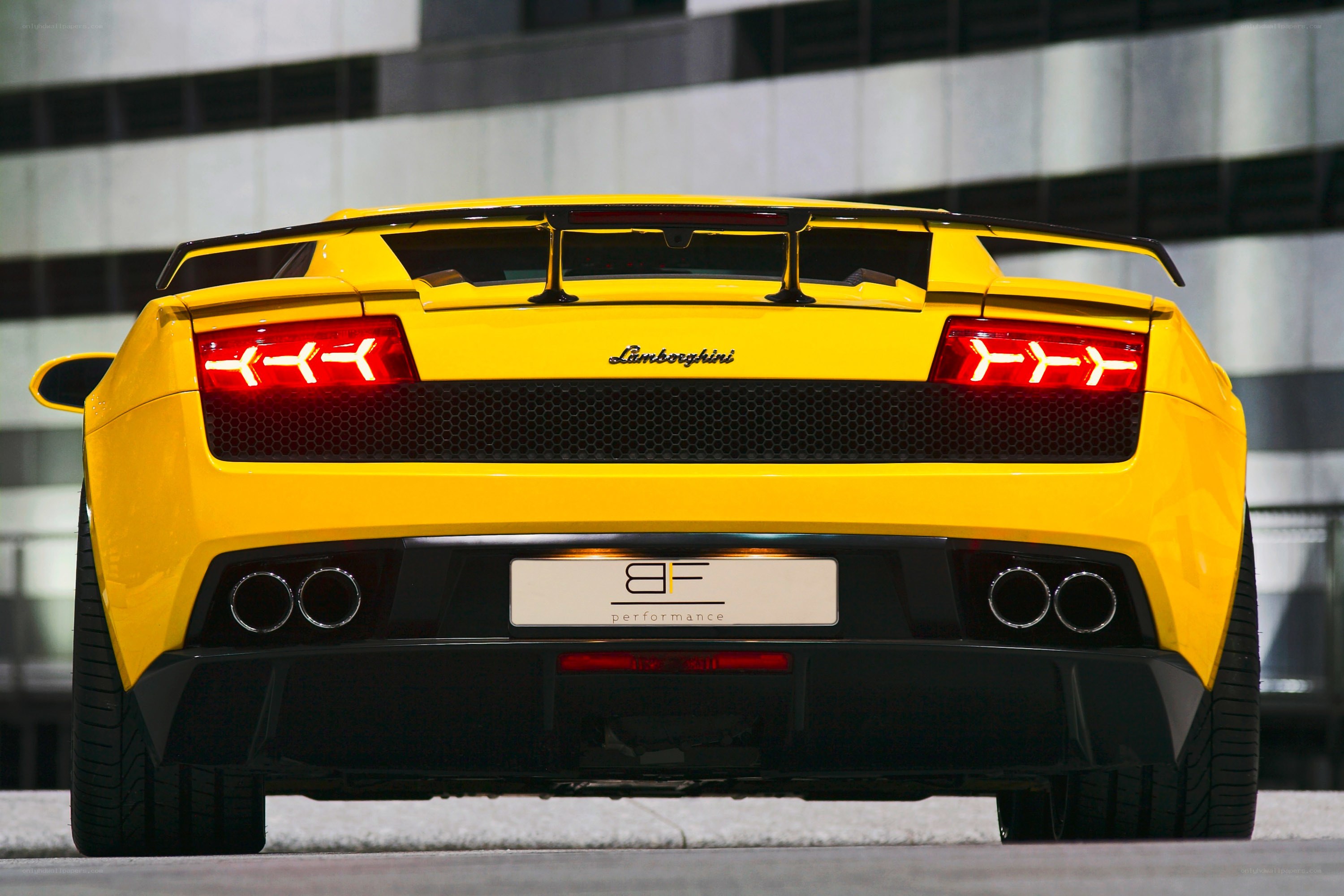 yellow lamborghini rear view