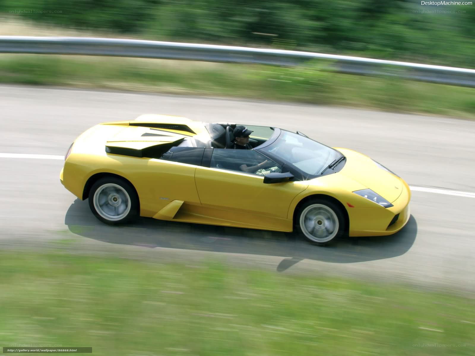 yellow lamborghini roadster in motion
