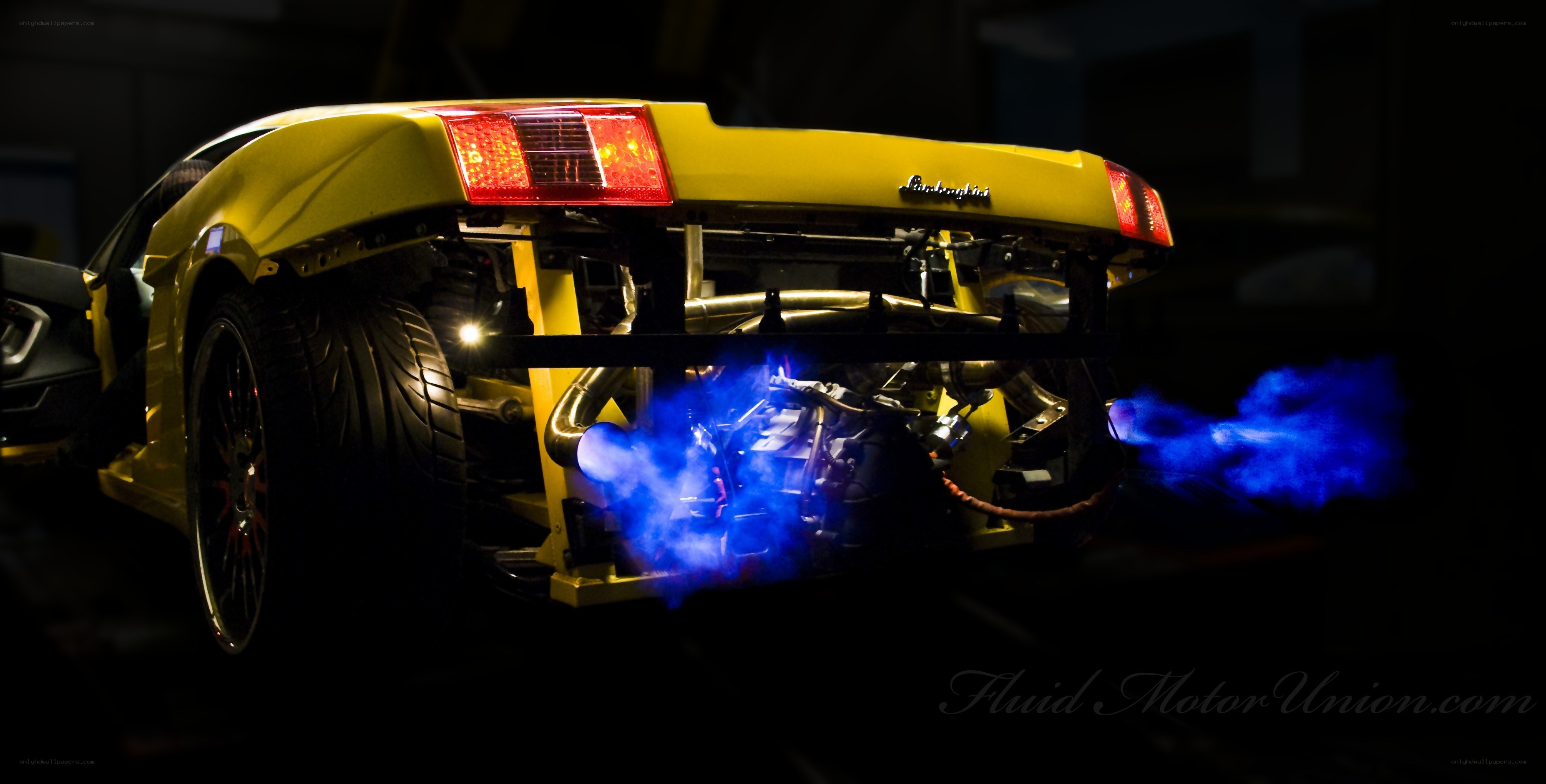 Yellow Lamborghini with blue flames