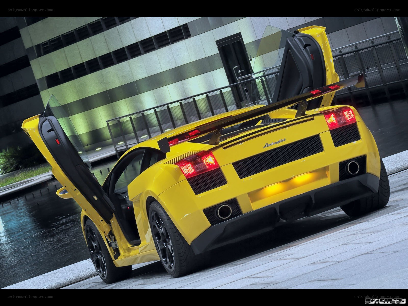 Yellow Lamborghini with doors open