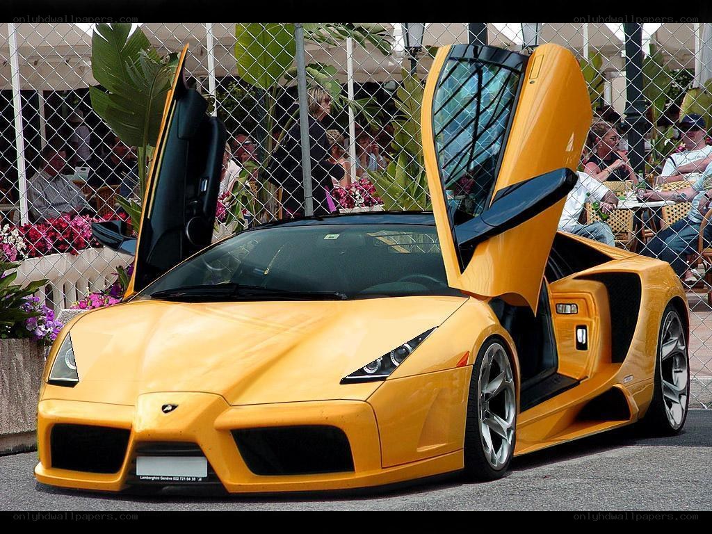 Yellow Lamborghini with doors open