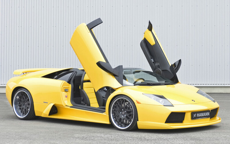 Yellow Lamborghini with doors open