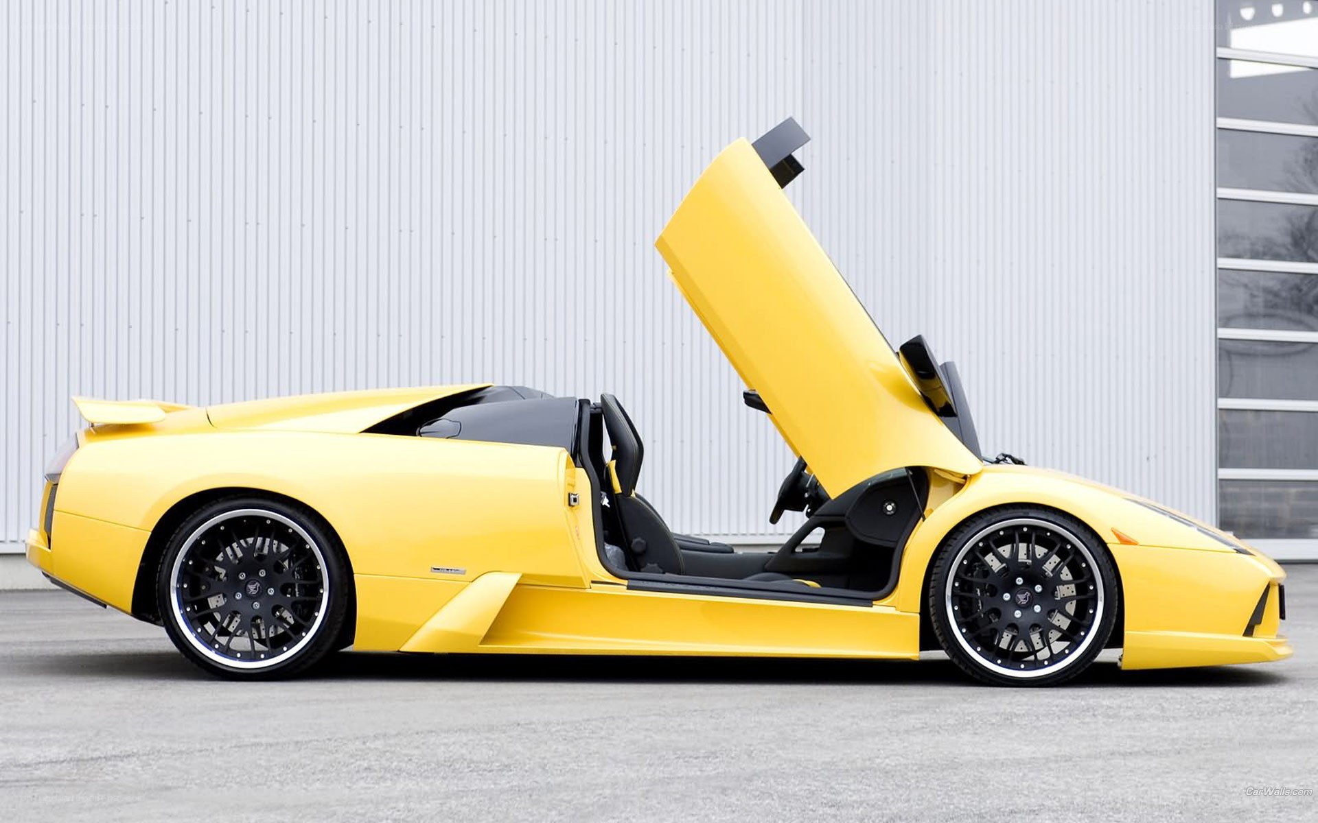 yellow Lamborghini with open door