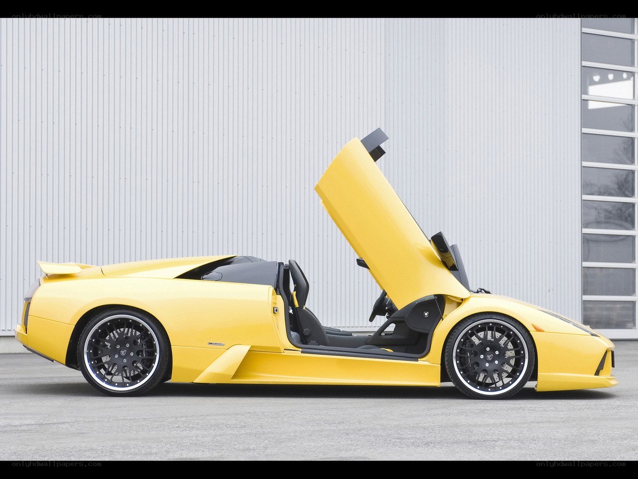 Yellow Lamborghini with open door
