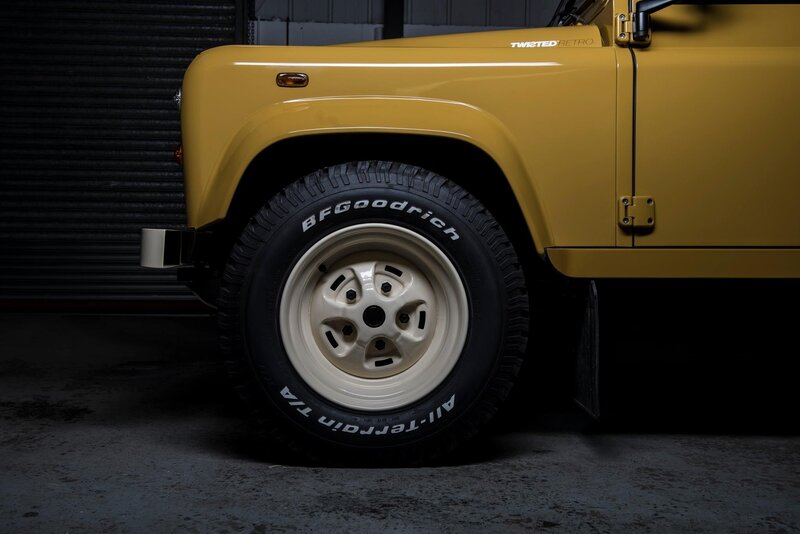 Yellow Land Rover Defender