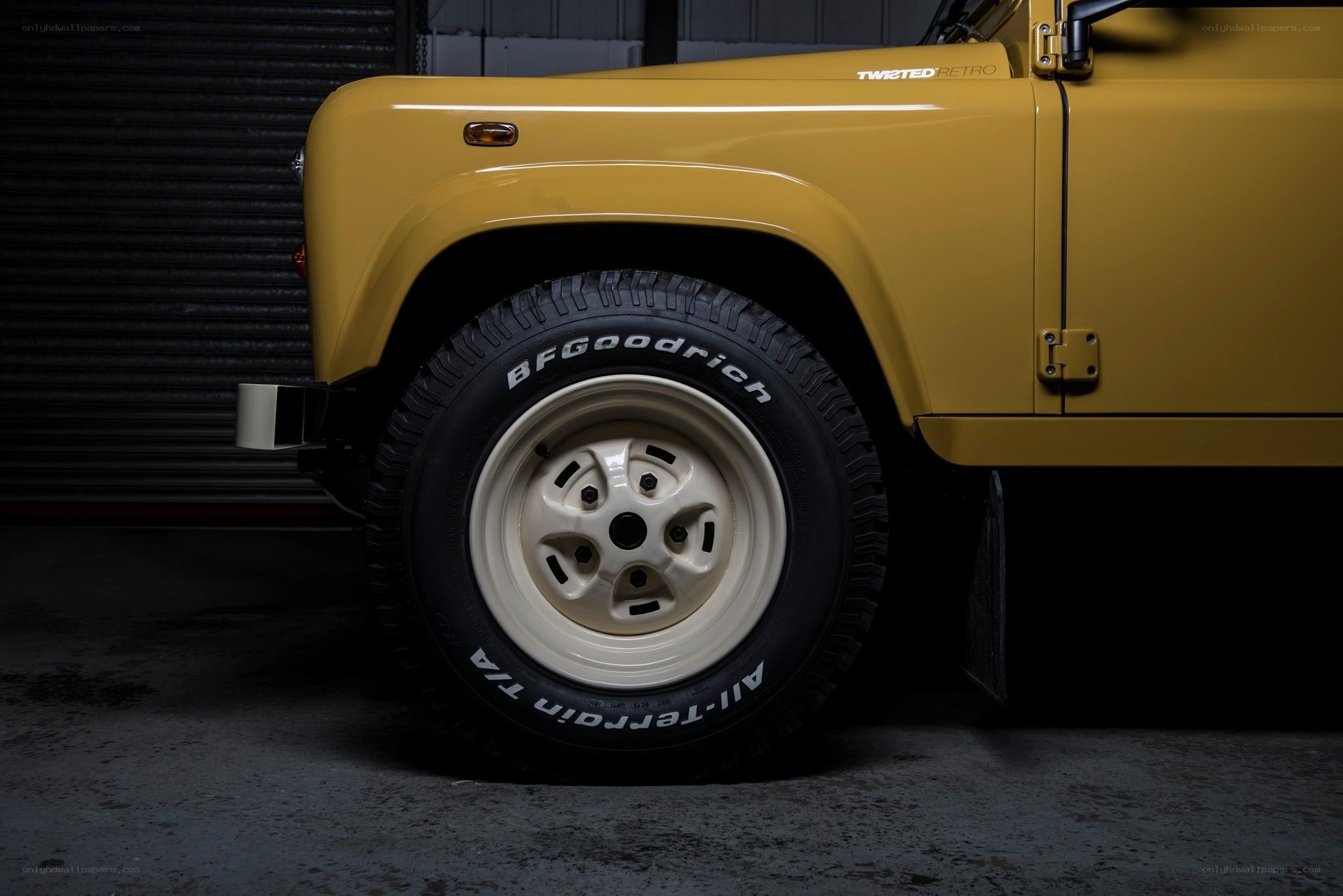 Yellow Land Rover Defender