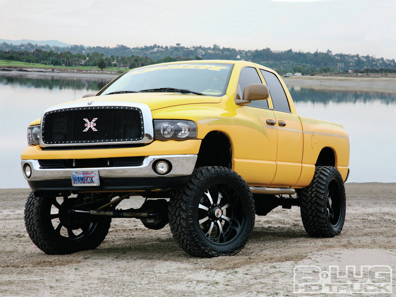 Yellow Lifted Pickup Truck