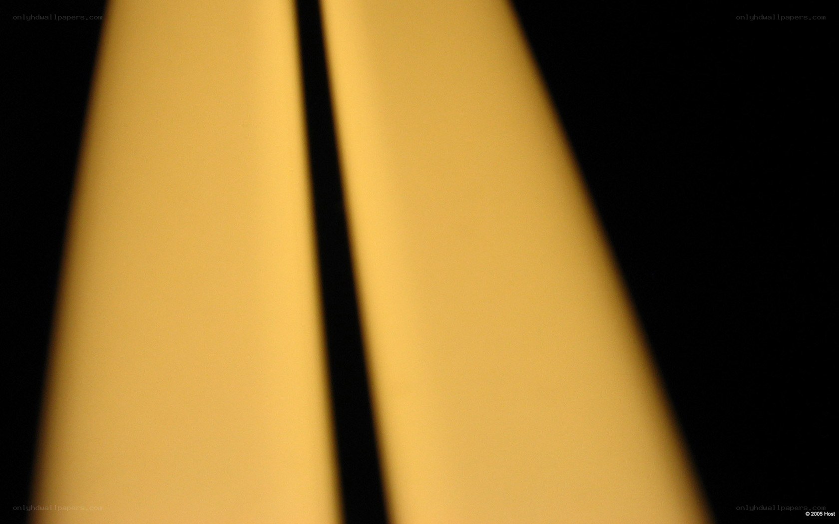 yellow light beams on black