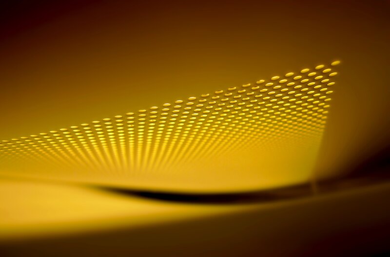 Yellow light through perforated surface