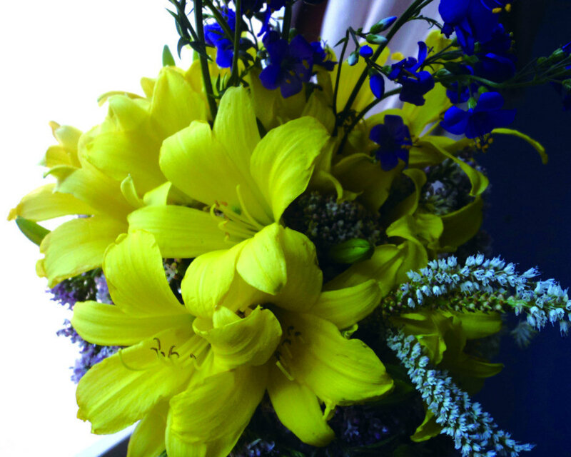 Yellow Lilies and Blue Flowers