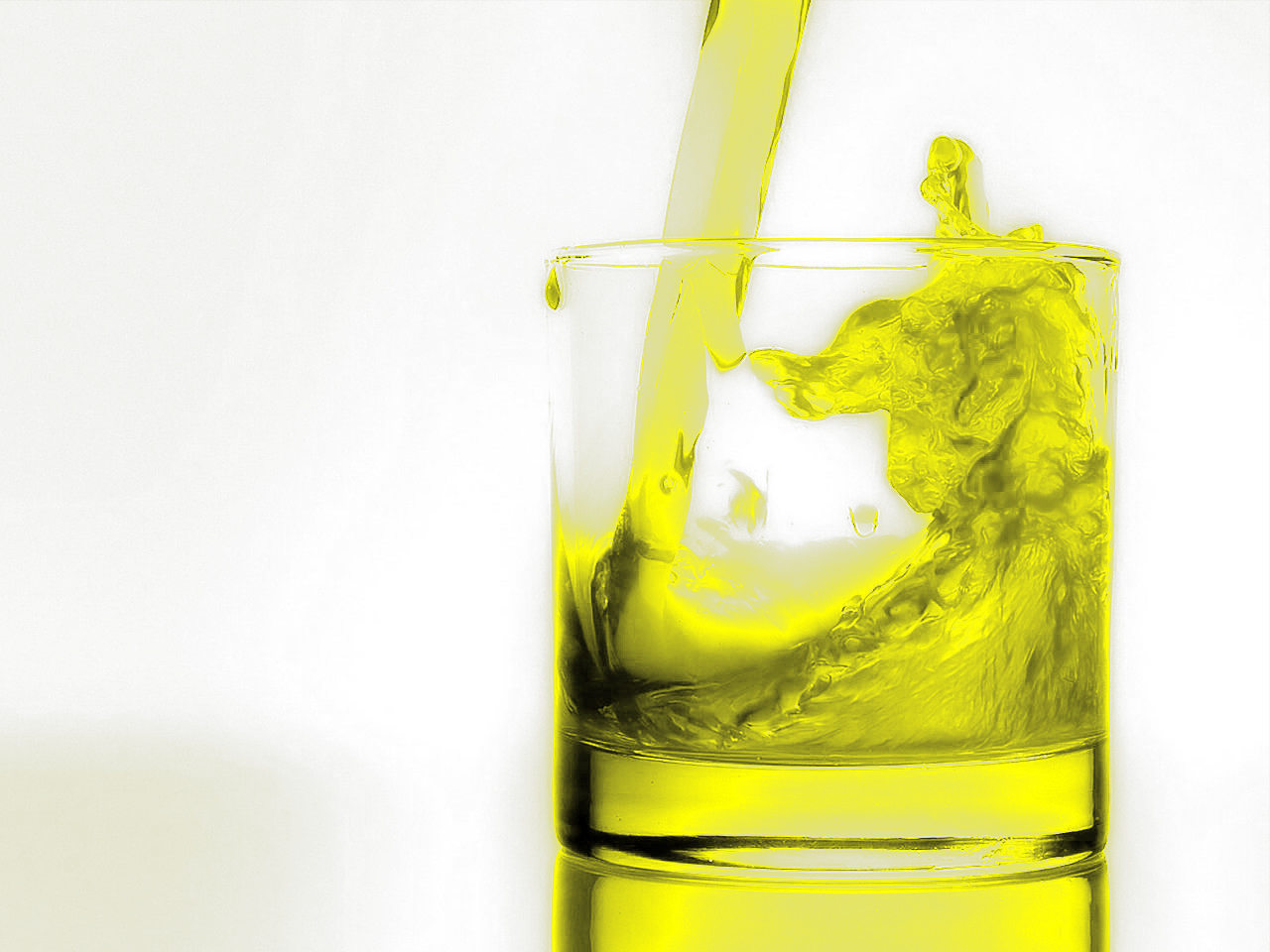 yellow liquid being poured