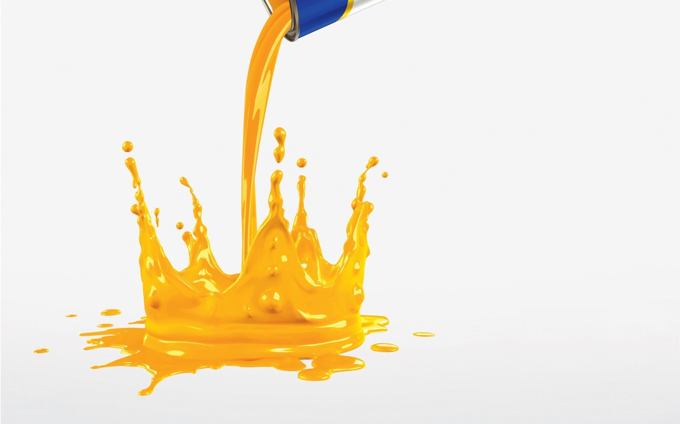 yellow liquid splashing from can