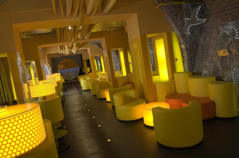 yellow-lit lounge interior