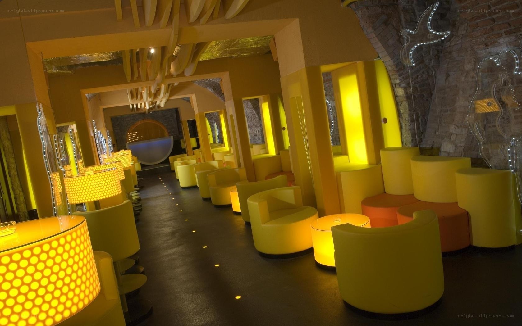 yellow-lit lounge interior
