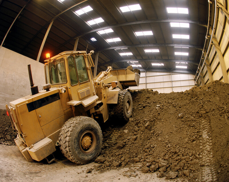 Yellow loader in warehouse