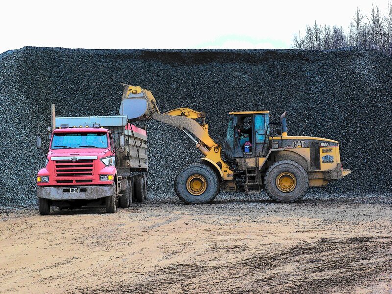 Yellow Loader Loading Gravel
