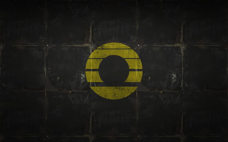 yellow logo on dark wall