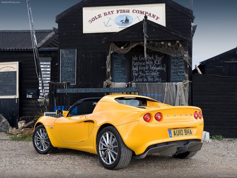Yellow Lotus Elise at fish shop