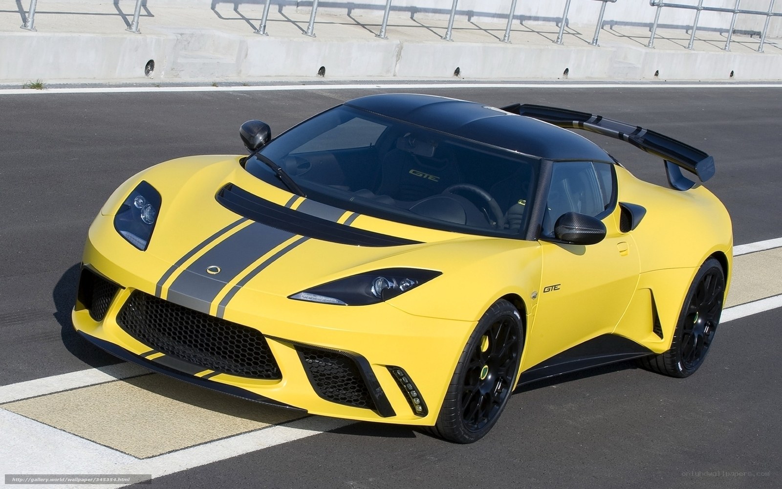 Yellow Lotus GTC on racetrack
