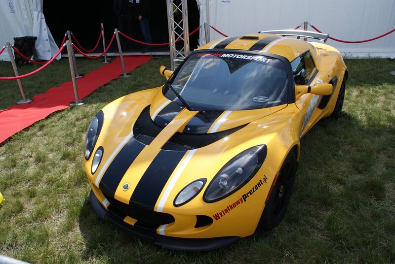 Yellow Lotus sports car on display