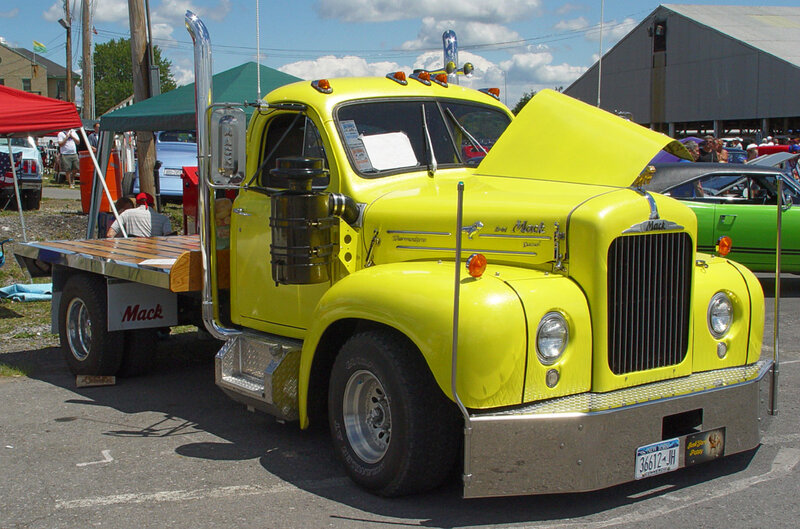 Yellow Mack truck at car show