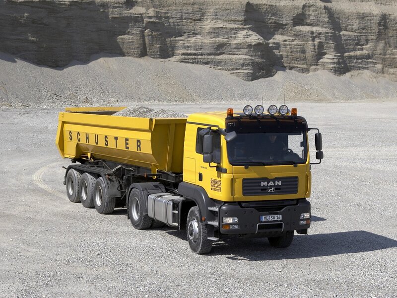 Yellow MAN dump truck in quarry
