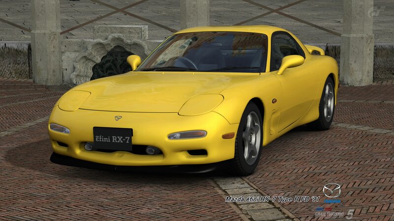 Yellow Mazda RX-7 Car