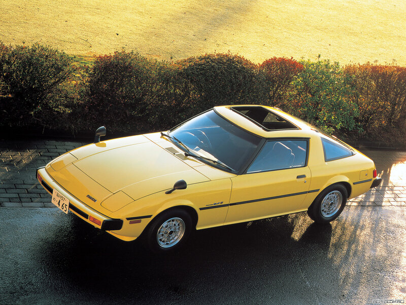 Yellow Mazda RX-7 sports car