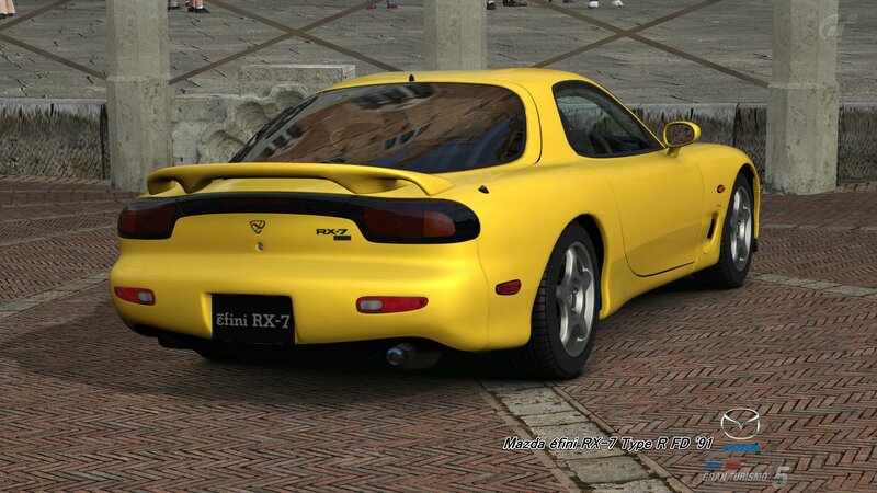 Yellow Mazda RX-7
