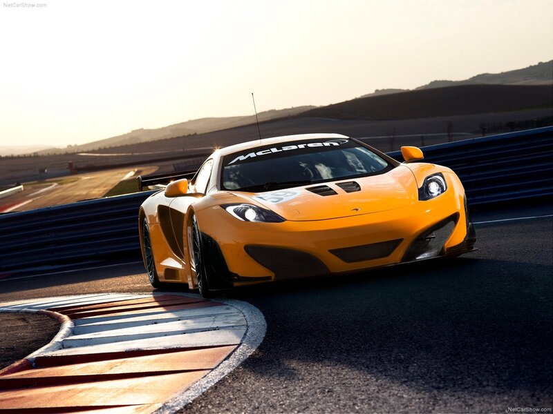Yellow McLaren on a racetrack