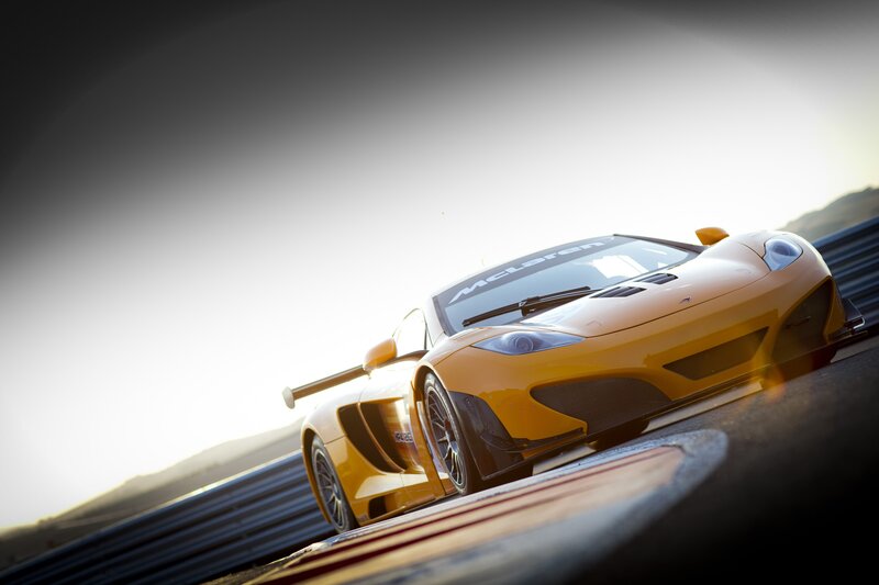 Yellow McLaren on a racetrack